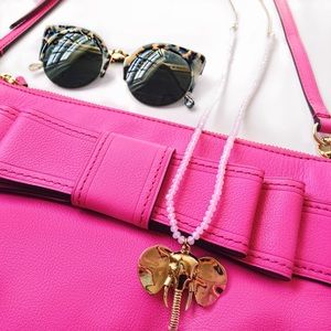 Kate Spade pink leather bow crossbody purse bag